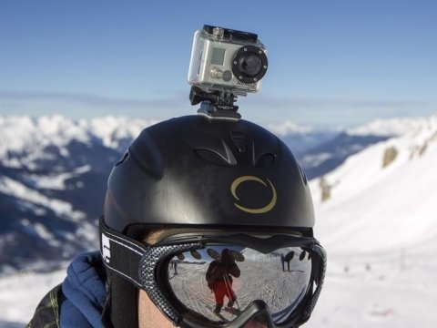 a-gopro-camera-is-seen-on-a-skiers-helmet-as-he-rides-down-the-slopes-in-the-ski-resort-of-meribel-french-alps-january-7-2014-reutersemmanuel-foudrot